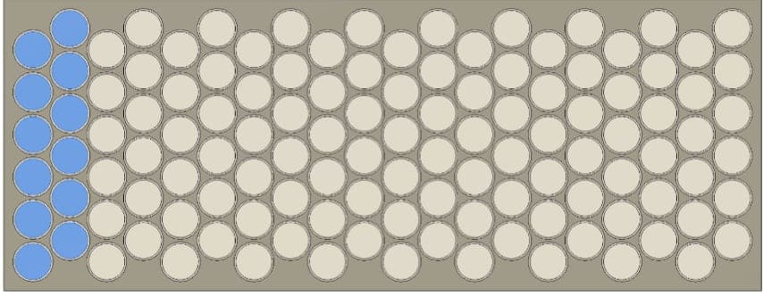 Top view of one battery module's honeycomb cell layout with one parallel group of twelve cells highlighted